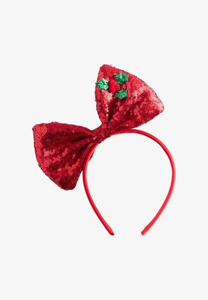 Red sequin headband featuring a large bow with a green holly decoration and red pom-pom at the center. Smooth, flexible band.