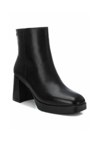 Carmela Botines con plataforma - black
