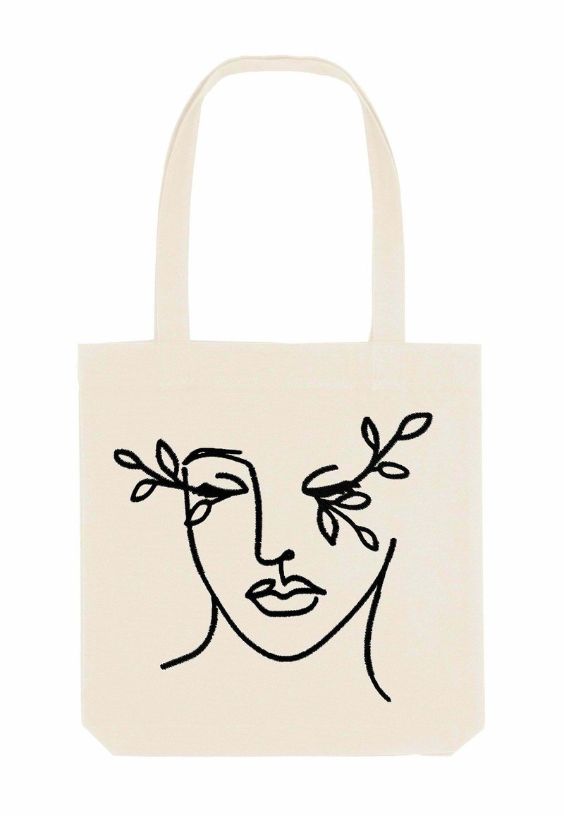 Canvas tote bag in off-white met een minimalistische zwarte lijntekening van een gezicht en bladeren. Beschikt over twee stevige handvatten voor gemakkelijk dragen.