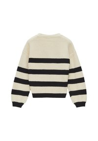 Pull en tricot avec un col rond, doté de rayures horizontales noires et crème. Design légèrement court avec des poignets et un ourlet côtelés.