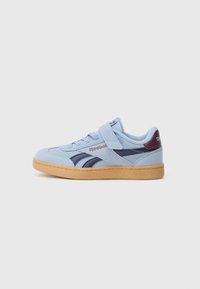 Blue suede sneaker with navy accents, beige rubber sole, lace and velcro closure, featuring Reebok branding on the tongue and heel.