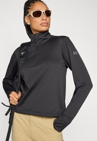 Μαύρο, ελαφρύ μπουφάν με φερμουάρ, υφασμένο με υφή και ψηλό γιακά, με λογότυπο στον αριστερό μανίκι και casual εφαρμογή.