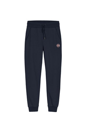 Pantaloni della tuta blu navy realizzati in tessuto morbido, con vita regolabile con cordino, due tasche laterali e una patch rotonda con logo sulla coscia.