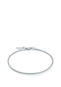 Bracelet en argent avec un design flexible et texturé, et un fermoir en forme de homard. Présente une petite étiquette gravée "TOMMY HILFIGER".