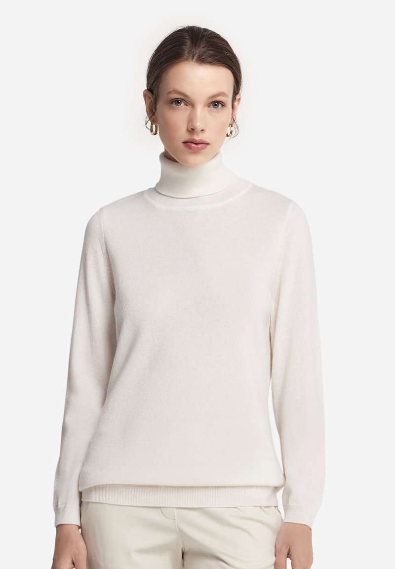 Weißer Rollkragenpullover, lange Ärmel, weicher Stoff, figurbetontes Design, gerippter Saum und Bündchen, minimalistische Textur, sauberes und einfaches ästhetisches Erscheinungsbild.