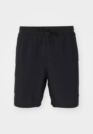 Mustad mustefilmid, mis on valmistatud kerge kangaga, näga elastne vöökoht koos nöörriga, küljetaskud ja diskreetne logodetail.