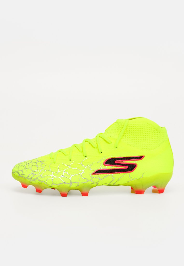 Botines de fútbol para terreno firme
