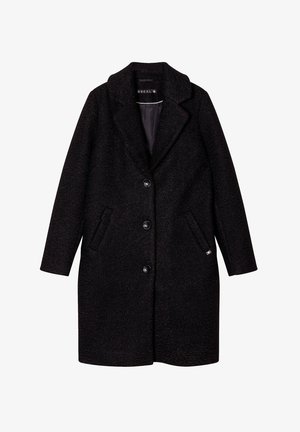 Manteau en mélange de laine noir avec un col cranté, des boutons à l'avant, deux poches latérales et une coupe droite. Doublure intérieure lisse.