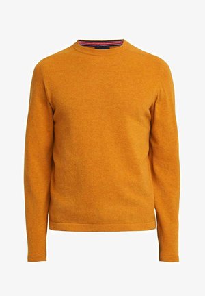 Šviesiai oranžinė megztinis su apvaliu iškirpimu, pagamintas iš minkštos medžiagos. Yra mėlynos ir raudonos juostelės vidinėje apykaklėje. Ilgos rankovės.