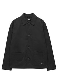 Black jacket with a collar, full button closure, two front pockets, and a small logo tag on the lower pocket side. Cotton material.