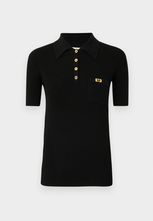 Black ribbed polo shirt with a structured collar, gold buttons, a single chest pocket, and a decorative gold accent on the pocket.