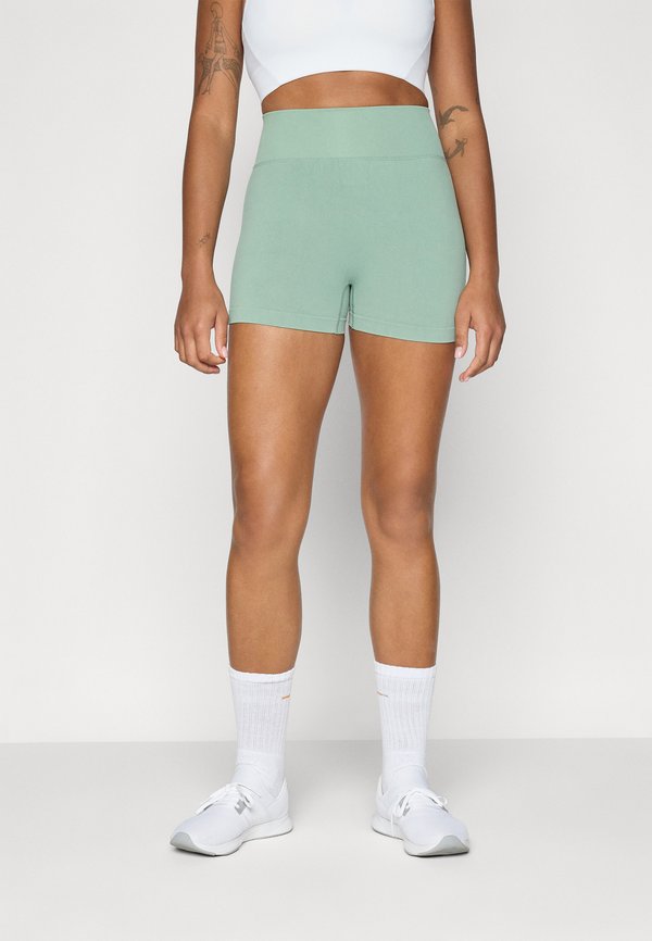 DEFINE SEAMLESS V SHAPE SHORTS - Tights - light moss