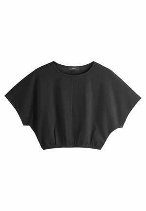 Top court noir en tissu texturé avec un col rond et des manches larges, présentant un ourlet froncé pour un ajustement décontracté.