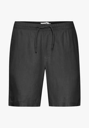 Kerged mustad lühikesed püksid, mis on valmistatud kergest elastsemast kangast, millel on elastne vöökoht ja reguleeritav nöör. Pükstel on sile tekstuur ning nähtavaid taskuid pole.