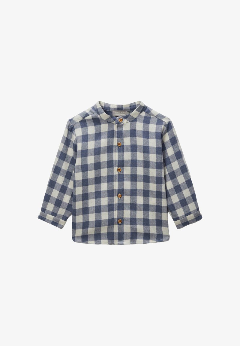 Chemise boutonnée à motifs vichy bleu marine et blanc, à manches longues et col rond. Présente des boutons en bois sur le devant.