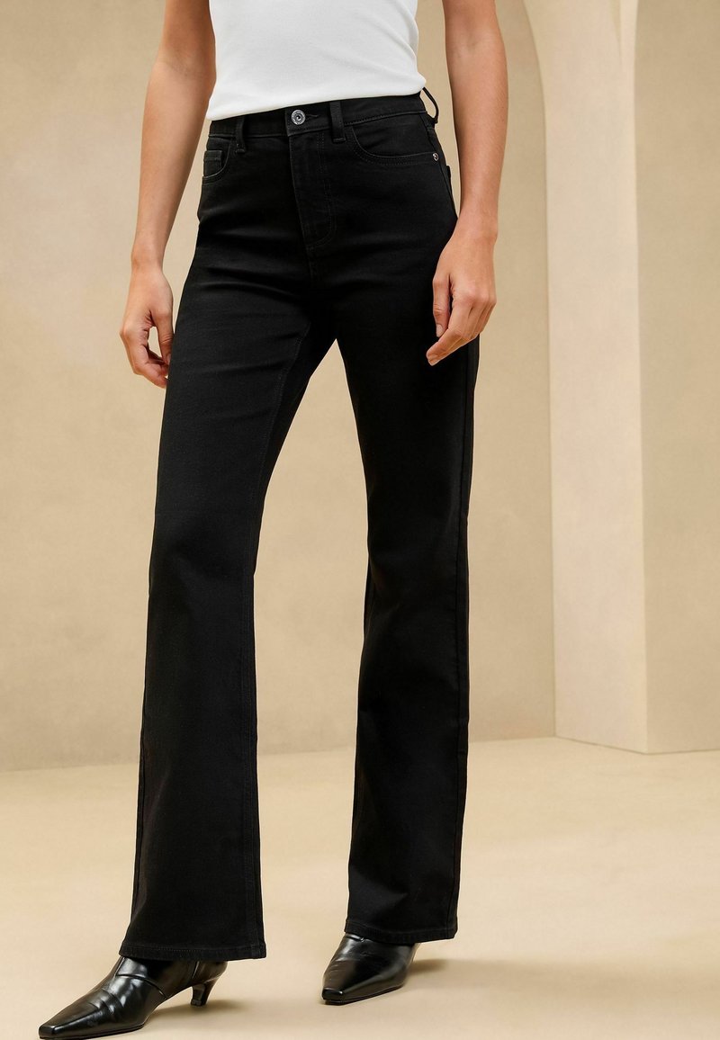 Lipsy PETITE FIT Bootcut jeans black Zalando - Main Image