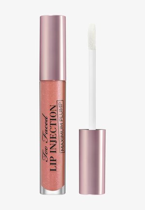 Clear pink lip gloss with subtle shimmer in a transparent tube. Features a metallic pink cap and a white applicator wand.