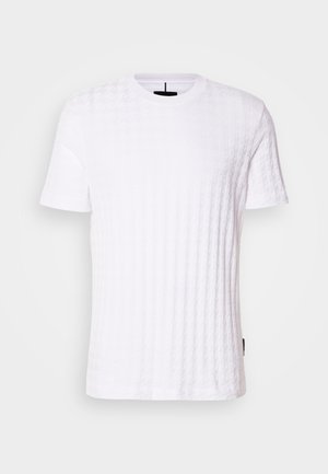 White short-sleeve t-shirt featuring a textured, waffle-like pattern throughout, with a crew neckline and subtle branding on the side.