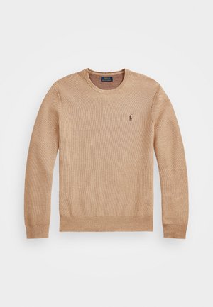Beige knit sweater featuring a round neckline, ribbed cuffs and hem, and a small embroidered logo on the left chest.