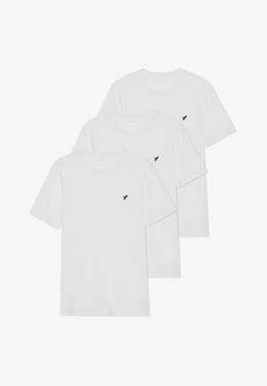 Three white cotton t-shirts with short sleeves, round necklines, and a small black logo on the left chest. Simple and classic design.