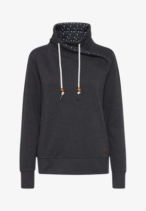 Tumši pelēks sporta krekls ar augstu apkakli. Iekšpusei ir rakstains oderējums, ir regulējami auklas ar koka akcentiem, kā arī ribotas aproces.