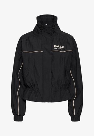 Zwarte hoodie met een losse pasvorm, elastische tailleband en manchetten, met contrasterende witte piping en het logo "BALL THE JEANS '74" op de borst.