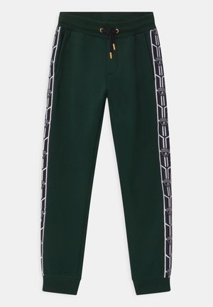 SHIELD TAPE - Pantalon de survêtement - green hydra
