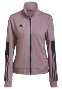 Lichtroze sportjack met rits en hoge kraag, textuurstof, marineblauwe accenten op de mouwen en drie marineblauwe strepen op de manchetten.