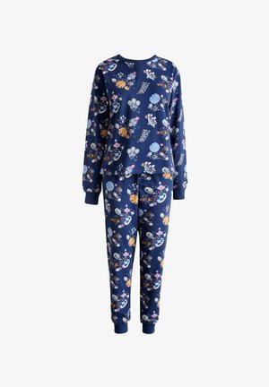 Merimiehen sininen pyjamapuku kukkakuvioilla, jossa on pitkähihaiset yläosa ja kapenevat housut, valmistettu pehmeästä kankaasta. Mukana kuvioidut sukat.