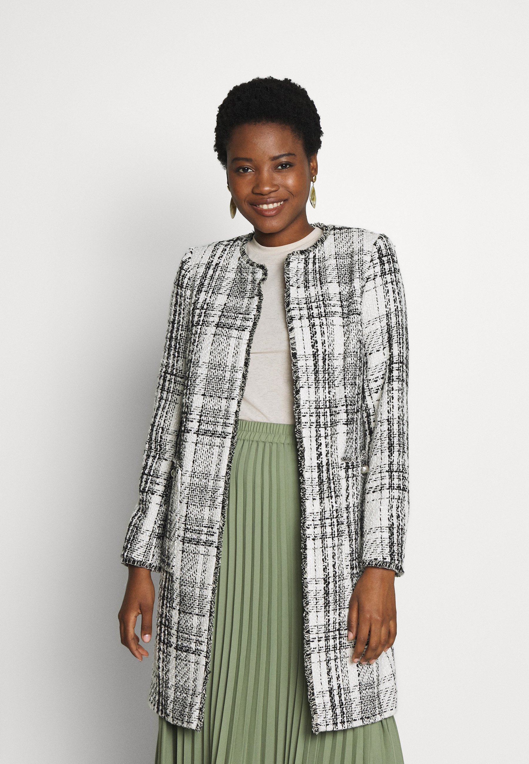 cream collarless jacket