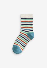 Calzini a righe con una base crema, caratterizzati da strisce blu, verdi, rosse e blu scuro. Tessuto morbido con un accento azzurro chiaro sulla punta.