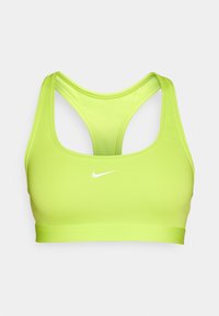 Sujetador deportivo verde neón con una textura suave, diseño de espalda nadadora y logo blanco de Nike centrado en la parte delantera.