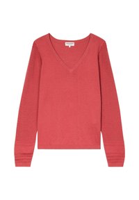 Top à manches longues en corail avec un corps uni et des manches texturées en maille ouverte. Doté de poignets et d'un ourlet côtelés pour une touche supplémentaire.