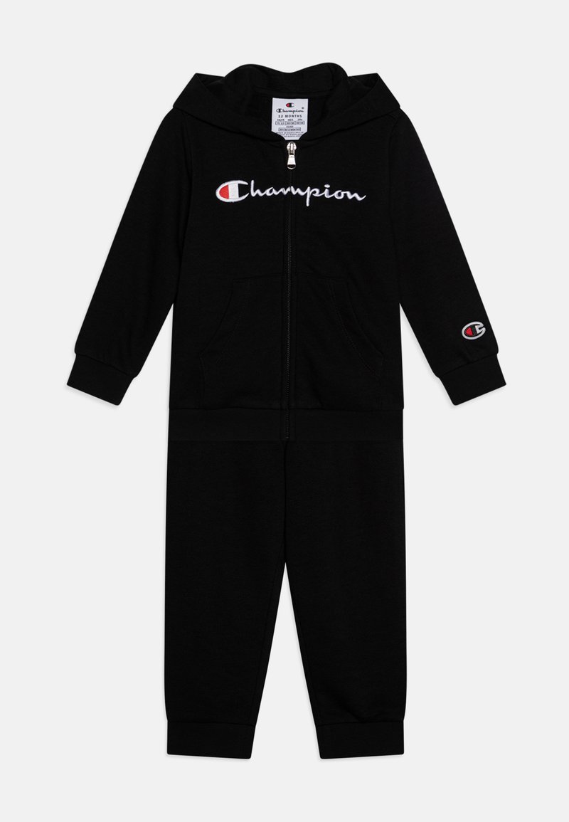 Black cotton tracksuit featuring a zip-up hoodie and elastic cuffs, with an embroidered Champion logo on the chest and sleeve.