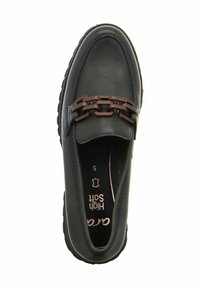 Chaussure en cuir noir à enfiler avec une accent en chaîne à l'avant, doublure intérieure douce et semelle texturée pour une meilleure adhérence. Taille 5.