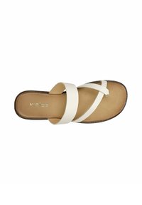 Sandale beige à bout ouvert avec des brides blanches larges et fines qui se croisent sur le dessus et une semelle marron avec le nom de la marque "wojas" à l’intérieur.