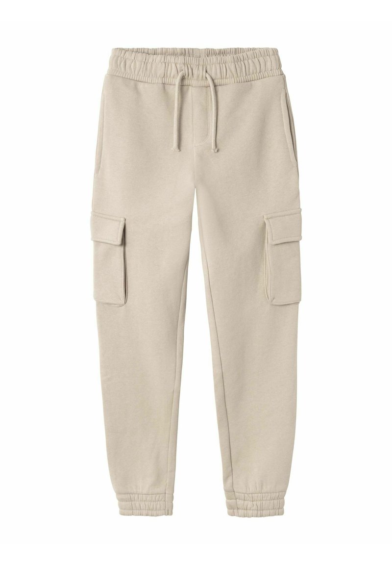Pantalones jogger beige confeccionados en tejido suave, con cintura elástica, cordón y bolsillos laterales tipo cargo. Con tobillos acampanados para un ajuste entallado.