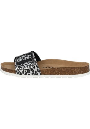 Sort og hvid leopardprint slide sandal med en bred rem og spænde, korksål og en hvid gummisål.