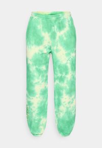 Παντελόνια φόρμας με πράσινο βαφή γραβάτα, μαλακή υφή, ελαστική μέση, στενά μανσέτες και κεντητή λεπτομέρεια με λουλούδια στο αριστερό πόδι.