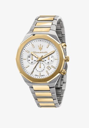 Zilveren en gouden roestvrijstalen horloge met octagonale kast, witte gestructureerde wijzerplaat, drie subdials en datumaanduiding. Waterbestendig tot 100m.