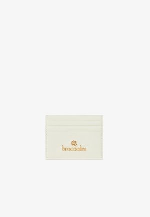 Porte-cartes blanc avec quatre emplacements pour cartes et logo doré Braccialini ainsi qu'un emblème rose au centre avant.