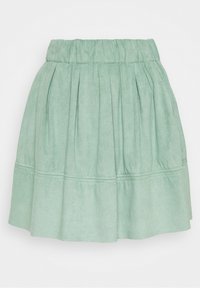 Mintgrön kjol med elastisk midja, plisserad design och utsvängd nederkant. Mjuk textur och avslutad med horisontella sömnadsdetaljer.