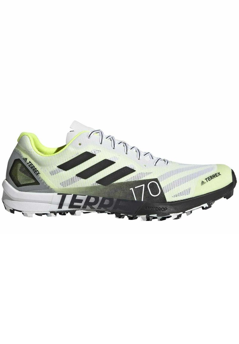 Lightweight athletic shoe with a white mesh upper, black stripes, and a bright yellow heel accent. Features a rugged black outsole for traction.