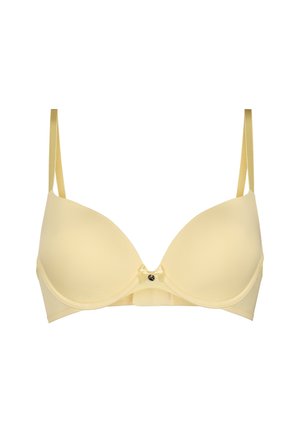 Light yellow padded bra with adjustable thin straps and small decorative bow with charm at center front.
