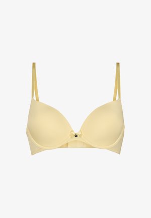 Light yellow padded bra with adjustable thin straps and small decorative bow with charm at center front.