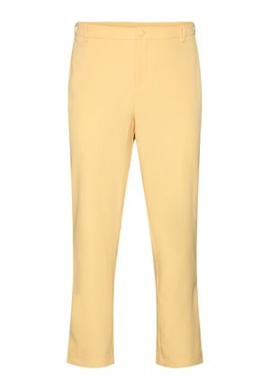 Svetložlté priliehavé nohavice s gombíkom a zipsom na zapínanie, s pútkami na opasok a bočnými vreckami, skrátené na členkoch.