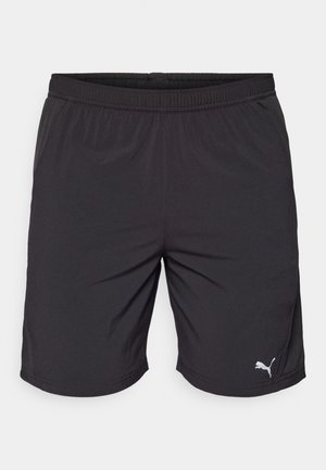 Black athletic shorts made of lightweight fabric with an elastic waistband. Features a small white Puma logo on the lower left.