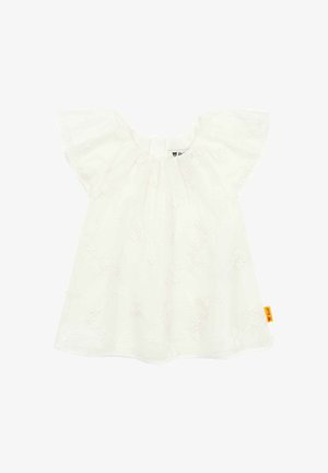 Weißes Kurzarmoberteil mit strukturiertem Blumenmuster, gerafftem Ausschnitt und einem kleinen Etikett in der unteren rechten Ecke. Weicher, leichter Stoff.