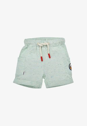 Pantaloni corti in cotone verde chiaro con una trama a macchie, cintura elastica e cordoncino rosso. Presentano tasche laterali e una toppa rotonda sulla gamba.