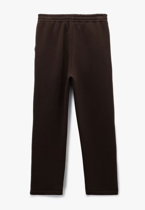 Bruine sweatpants met een elastische tailleband, gemaakt van zachte stof, met een aansluitend ontwerp en geen toevoegingen of accenten.
